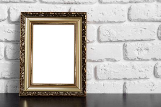 Photo frame with copy space against white brick wall