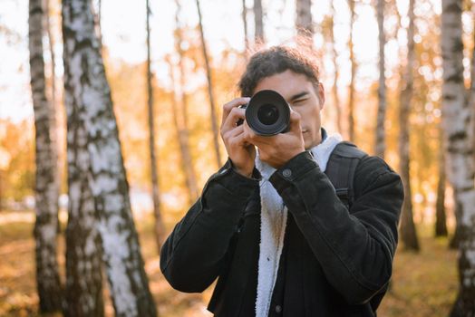Male photographer shooting landscapes