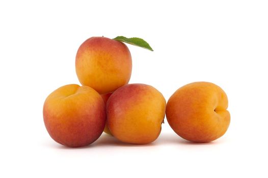 Ripe apricots isolated on a white background