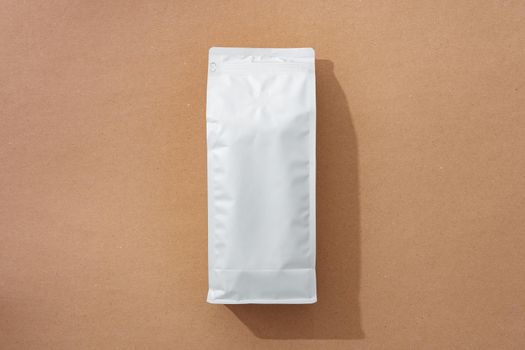 White blank matte coffee package on paper background