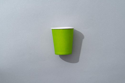 Top view of coffee cup on gray background