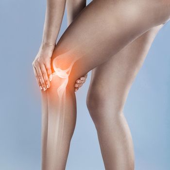 Knee injuries can linger. Concept shot of a woman with a painful knee joint.