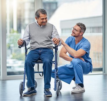 Your motor abilities are improving so much. Shot of a nurse helping a senior man with a walker.