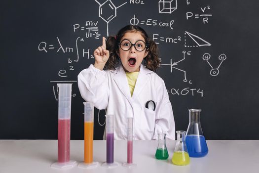 surprised scientist child having an idea