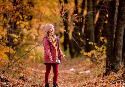 Preteen girl kid at autumn park