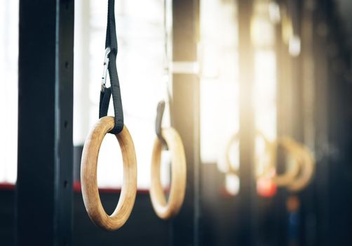 Give your body a lift. Shot of gymnastic rings at the gym.