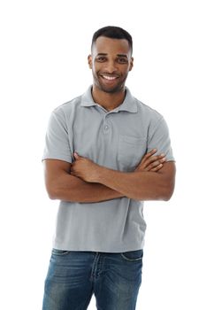 Feeling positive. A casually dressed african american man smiling while isolated on white.