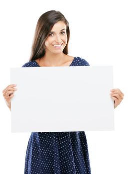 Its a sign. You were meant to see this. Studio portrait of an attractive young woman holding a blank placard against a white background.