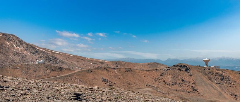 Wide panorama with astronomical observatories in Sierra Nevada