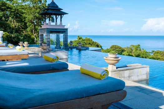Koh Lanta Thailand, luxury beach chairs by the swimming pool of an luxury hotel in Thailand