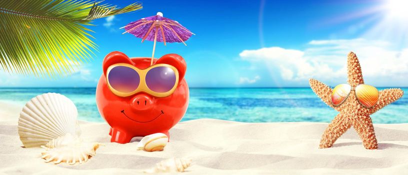 piggy bank with sunglasses on tropical beach - summer holiday.