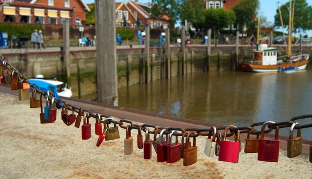 Love padlocks in a historical fishing harbour
