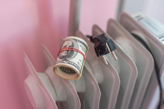 Heating. money dollars on the heating radiator. Payment for services. Energy. Utility bill