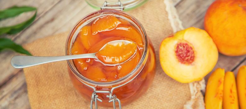Preservation of peach jam. Selective focus. food.