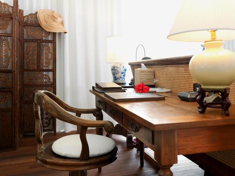 Wooden furniture suite. Luxurious hotel room with antique wooden furniture.