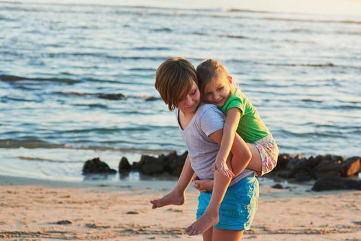 Summer days are best spent at the beach. Cropped shot of two young siblings enjoying the day together at the beach.