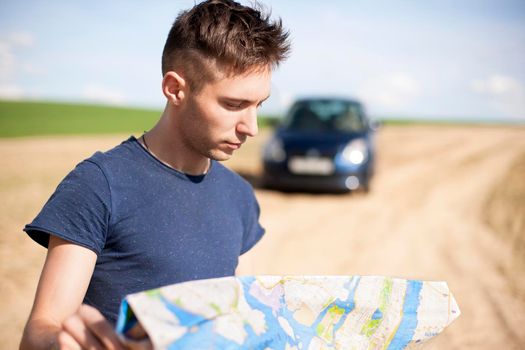 Traveler Reading the Map on the road