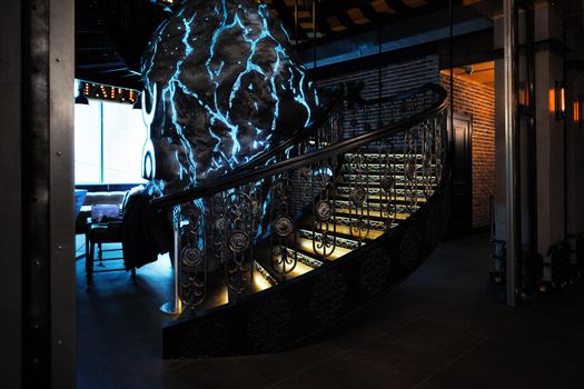 Dark and spooky urban staircase in a bar