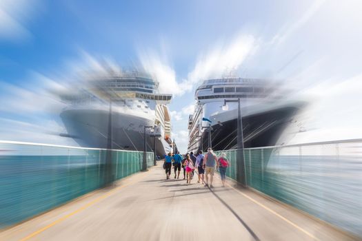 Cruise passengers return to cruise ships at St Kitts Port Zante cruise ship terminal with motion blur effect