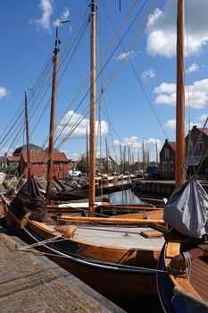 Wooden historical fishing cutters moored in Spakenburg