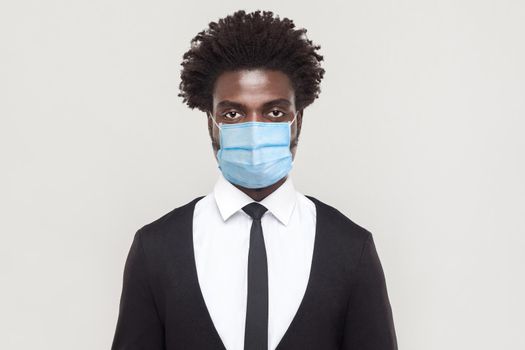 Protection against contagious disease, coronavirus. Man wearing hygienic mask