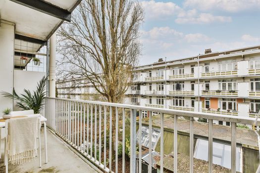 Panoramic view of white houses from a cozy balcony