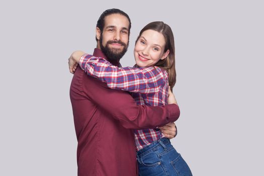 Emotional couple on gray background