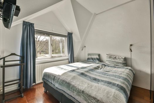 Spacious bright bedroom in a minimalist design