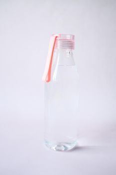 fresh drinking water in a pink color bottle