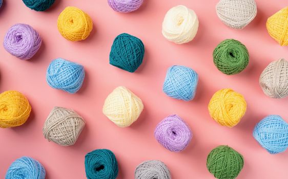 bright and colorful yarn wool pattern on bright background, top view flat lay