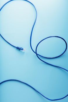 Blue UTP Internet Cable Isolated on a blue background Ethernet Cord