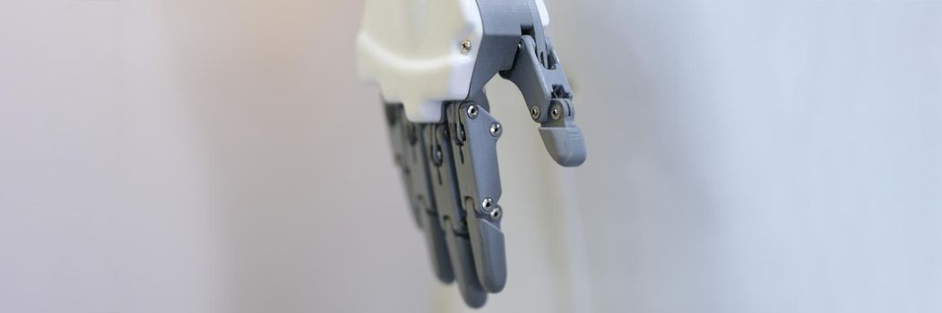 Robotic hand with fingers on a white background