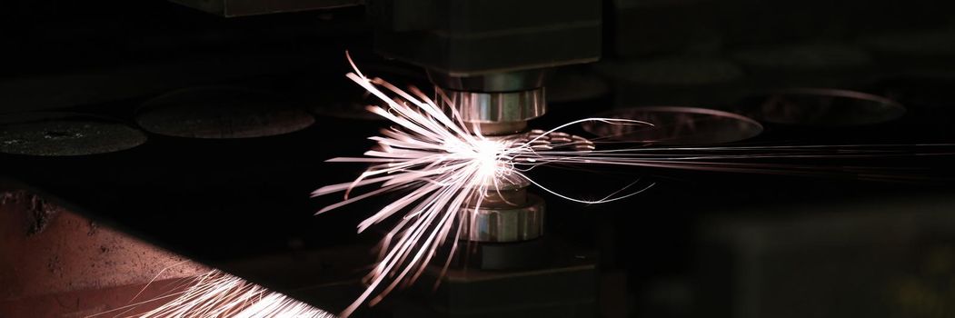 Bright sparks from metal turning, stream