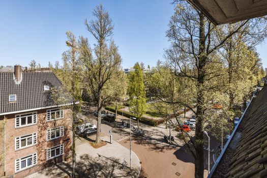 Panoramic view of brick buildings from balcony