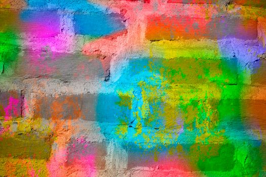 Brick wall with multi-colored paint close-up. Background brick creative.
