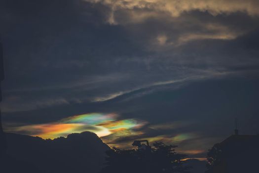 A Rare Look at an Iridescent Cloud. fire rainbows or rainbow clouds. Iridescent Pileus Cloud colorful optical phenomenon sky