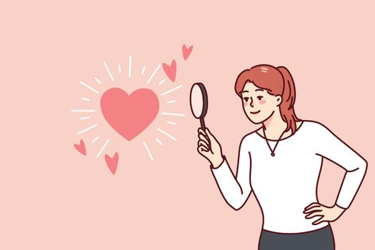 Woman using magnifier looking for love