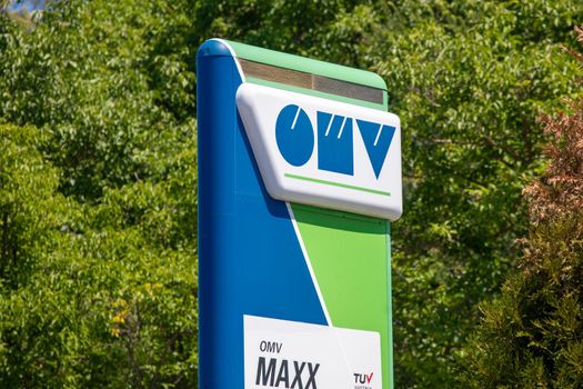 Logo and sign of OMV on gas station near Lazarevac, Serbia