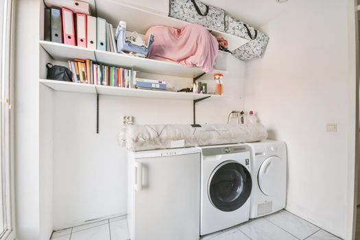 White room with washing machine