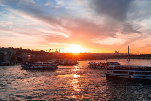 Boats in sea and scenic sunset in Istanbul