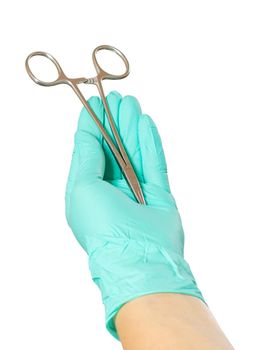 Hand with needle holder in the white background