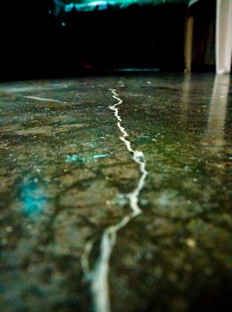 A Crack on the floor.