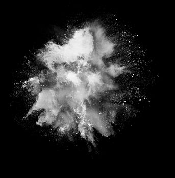 Black and white holi paint powder explosion isolated on black background