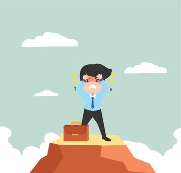 Worried  businessman climber standing on the top of mountain 