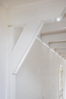 white ceiling with beams