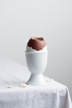 Chocolate eggs on white eggstand holder