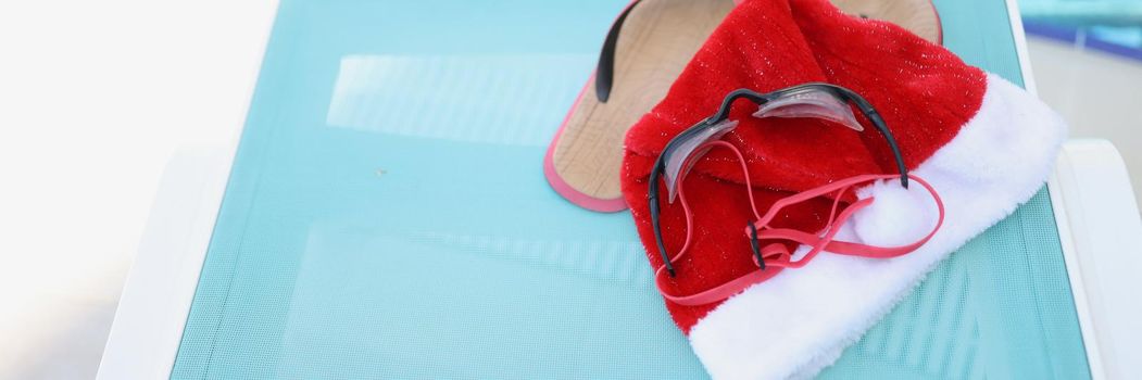 Santa Claus hat and accessories for swimming in the pool