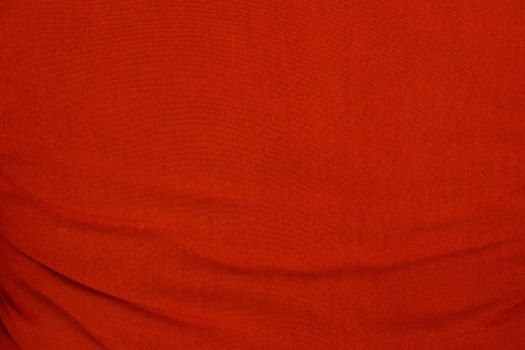 Red wrinkled fabric texture for background