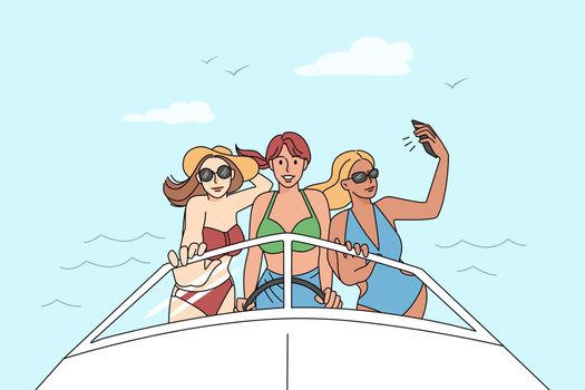 Happy girls in biking on yacht