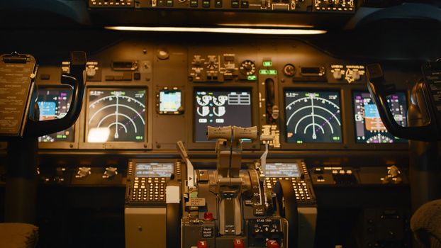 Empty airplane cockpit with dashboard navigation to takeoff